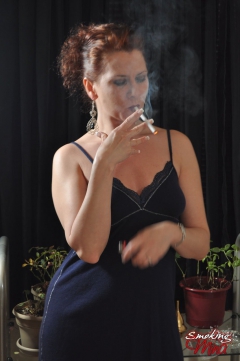 Sexy Smoking Mina in blue dress stripping
