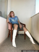 Teen blonde undresses and poses