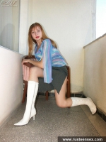 Teen blonde undresses and poses