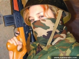 Russian teen in military uniform strips down