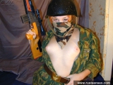 Russian teen in military uniform strips down