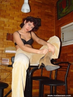 Russian teen brunette shows her pussy on the table