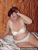 Fat mature brunette posing naked