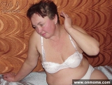 Fat mature brunette posing naked