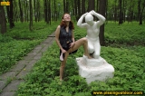 Outdoor pissing on the stone statue