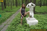 Outdoor pissing on the stone statue
