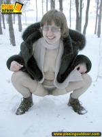 Pissing outdoor in the snow drift is a fun