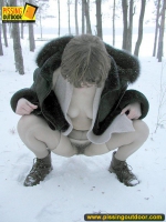 Pissing outdoor in the snow drift is a fun