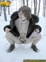 Pissing outdoor in the snow drift is a fun