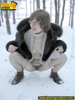Pissing outdoor in the snow drift is a fun