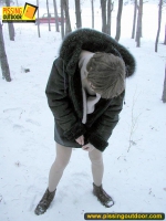 Pissing outdoor in the snow drift is a fun