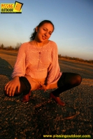 Outdoor pissing in the autumn of cute teen brunette
