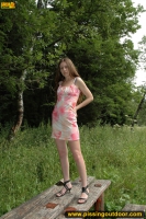 Outdoor pissing on a wooden table in the forest