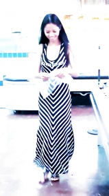 Sexy filipino babe in long striped skirt shopping for meat