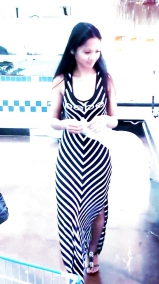 Sexy filipino babe in long striped skirt shopping for meat