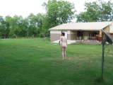 American couple posing to ranch