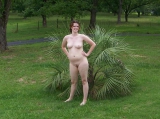 American couple posing to ranch
