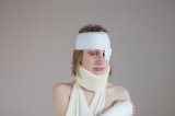 Bandaged injured sex slave