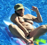 Pig in pool
