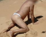 shemale ladydilva in a bikini on the beach showing off her a