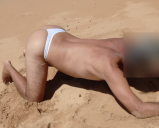 shemale ladydilva in a bikini on the beach showing off her a