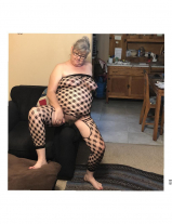 Chubby Kim posing in new outfit.