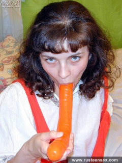 Teen brunette masturbates with orange dildo - N