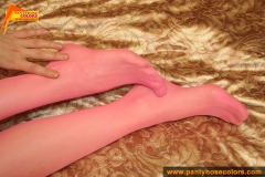 Teen in pink pantyhose on the bed - N