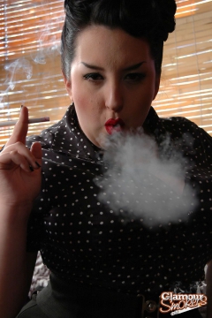 Busty babe posing sexy while smoking - N