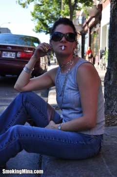 Sensual smoking vixen Mina enjoys blowing smoke rings - N