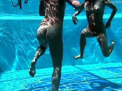 Jessica and Lindsay naked swimming in the pool