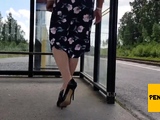 HannaTransa Chastity Crossdresser outdoors at train station.