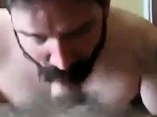 Bearded daddy sucks big hairy cock