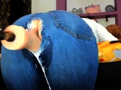 milf-in-ripped-jeans-fucks-machine-dick