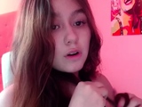 Small titted brunette teen fingering on the bed